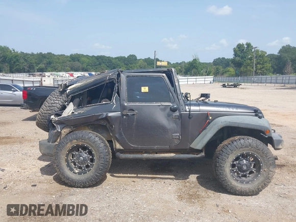 2014 Jeep Wrangler Sport with VIN 1C4AJWAGXEL233647, listed as a IAAI auction lot 39993785 with Not Provided miles and . Bid and sale history available at DreamBid. Image 14.
