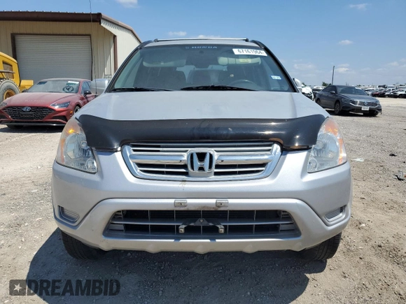 2002 Honda CR-V LX with VIN JHLRD68512C025394, listed as a Copart auction lot 67161964 with 143,660 mi miles and Salvage Title. Bid and sale history available at DreamBid. Image 5.