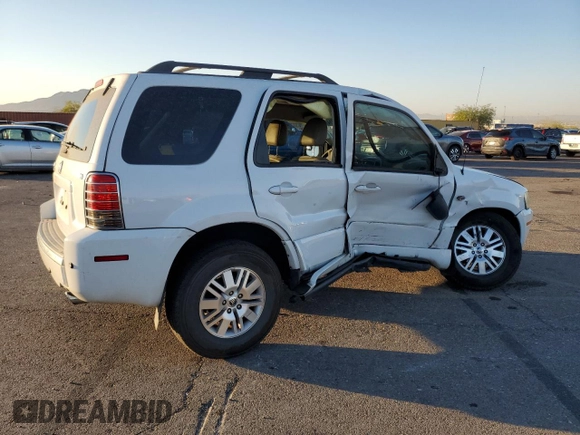 2005 Mercury Mariner Luxury z VIN 4M2CU56175DJ16949, wystawiony jako Copart lot #41901845 z przebiegiem 104 948 mil mil oraz Szkody całkowita. Historia ofert i sprzedaży dostępna na DreamBid. Obrazek 3.