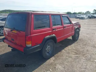 1999 Jeep Cherokee Sport with VIN 1J4FT68S4XL613395, listed as a IAAI auction lot 42316934 with 142,838 mi miles and . Bid and sale history available at DreamBid. Image 4.