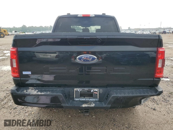 2023 Ford F-150 XL with VIN 1FTEW1C59PFC27499, listed as a Copart auction lot 54453255 with 58,554 mi miles and Salvage title. Bid and sale history available at DreamBid. Image 6.