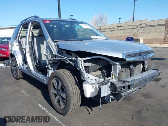 2018 Subaru Forester Limited with VIN JF2SJARC4JH435231, listed as a IAAI auction lot 42011028 with 51,901 mi miles. Bid and sale history available at carsss.com. Image 1.