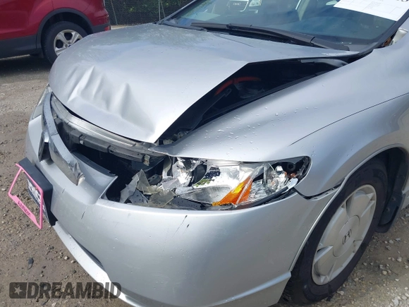 2007 Honda Civic with VIN JHMFA36267S028464, listed as a IAAI auction lot 42215413 with 121,682 mi miles and . Bid and sale history available at DreamBid. Image 17.