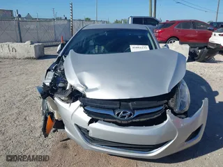2013 Hyundai Elantra GLS PZEV with VIN KMHDH4AE1DU531942, listed as a IAAI auction lot 41802232 with 108,241 mi miles. Bid and sale history available at carsss.com. Image 12.