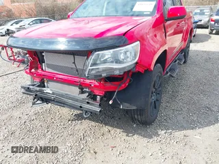2020 Chevrolet Colorado 4WD LT with VIN 1GCGTCEN0L1211032, listed as a IAAI auction lot 41855549 with 51,465 mi miles and . Bid and sale history available at DreamBid. Image 18.