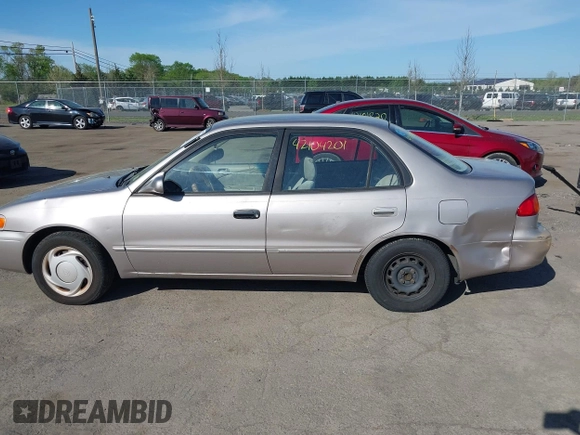 1998 Toyota Corolla VE z VIN 2T1BR18E9WC045442, wystawiony jako IAAI lot #42104201 z przebiegiem 243 256 mil mil oraz . Historia ofert i sprzedaży dostępna na DreamBid. Obrazek 14.