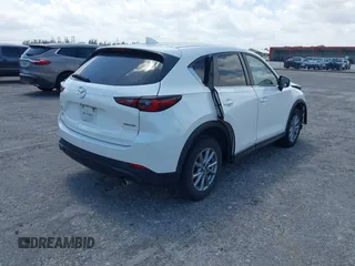 2022 Mazda CX-5 2.5 S Preferred Package with VIN JM3KFBCM1N1575573, listed as a IAAI auction lot 41976604 with 45,113 mi miles. Bid and sale history available at carsss.com. Image 4.