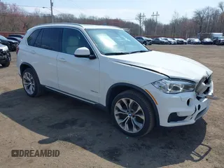 2017 BMW X5 xDrive35i z VIN 5UXKR0C34H0X77778, wystawiony jako IAAI lot #42005329 z przebiegiem 169 587 mil mil oraz . Historia ofert i sprzedaży dostępna na DreamBid. Obrazek 1.