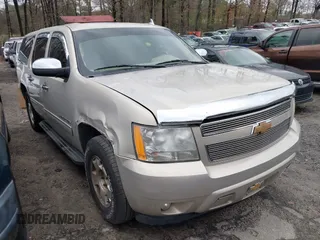 2010 Chevrolet Suburban LS with VIN 1GNUCHE03AR226103, listed as a IAAI auction lot 41729881 with 201,479 mi miles. Bid and sale history available at carsss.com. Image 1.