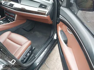 2016 BMW 5 Series Gran Turismo 550i xDrive with VIN WBA5M0C53GD085191, listed as a IAAI auction lot 41679692 with 117,326 mi miles. Bid and sale history available at carsss.com. Image 5.