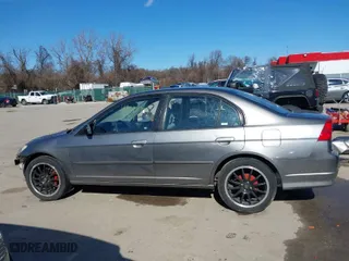 2004 Honda Civic LX with VIN 2HGES16664H624292, listed as a IAAI auction lot 41597991 with 207,443 mi miles. Bid and sale history available at carsss.com. Image 15.