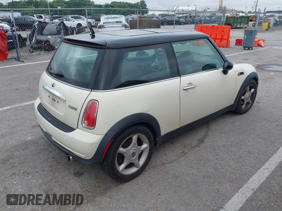 2006 MINI Hardtop with VIN WMWRC33566TK73763, listed as a IAAI auction lot 42782654 with 103,751 mi miles and . Bid and sale history available at DreamBid. Image 4.
