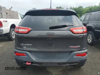 2015 Jeep Cherokee Trailhawk with VIN 1C4PJMBS0FW655167, listed as a Copart auction lot 64597165 with 193,779 mi miles and Clean title. Bid and sale history available at DreamBid. Image 6.