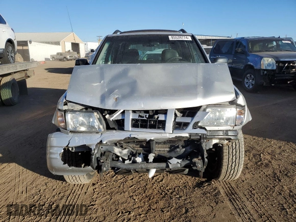 2003 Isuzu Rodeo with VIN 4S2DM58W734305363, listed as a Copart auction lot 85539774 with 219,300 mi miles and Salvage title. Bid and sale history available at DreamBid. Image 5.