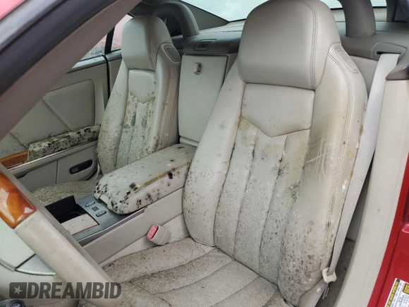 2005 Cadillac XLR z VIN 1G6YV34A855601016, wystawiony jako Copart lot #74436784 z przebiegiem Nie podano mil oraz Szkody całkowita. Historia ofert i sprzedaży dostępna na DreamBid. Obrazek 10.