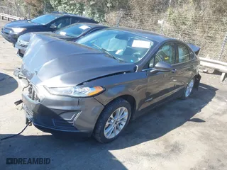 2019 Ford Fusion Hybrid SE with VIN 3FA6P0LU1KR235021, listed as a IAAI auction lot 41660786 with 93,331 mi miles. Bid and sale history available at carsss.com. Image 19.