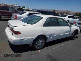 1997 Toyota Camry LE with VIN JT2BG22K7V0005405, listed as a Copart auction lot 58988545 with 268,952 mi miles and Salvage title. Bid and sale history available at DreamBid. Image 3.