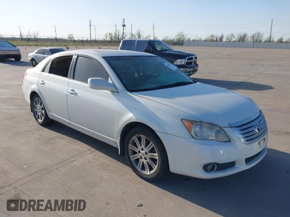 2008 Toyota Avalon XL with VIN 4T1BK36BX8U318365, listed as a IAAI auction lot 41857162 with 166,196 mi miles. Bid and sale history available at carsss.com. Image 1.