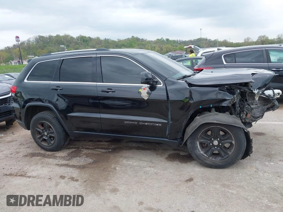 2017 Jeep Grand Cherokee Laredo with VIN 1C4RJFAG2HC649408, listed as a IAAI auction lot 42072440 with 58,818 mi miles and . Bid and sale history available at DreamBid. Image 13.