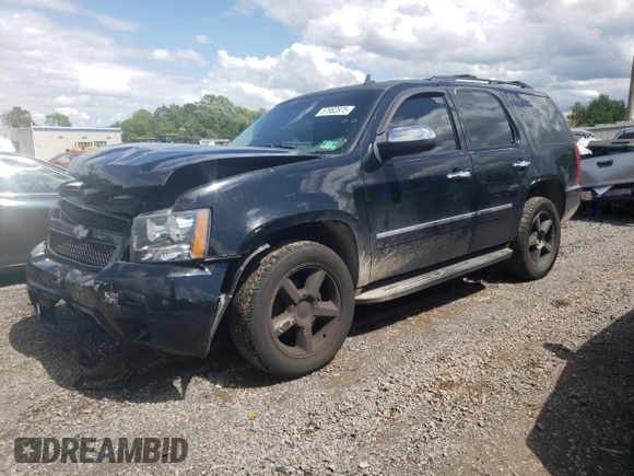 2009 Chevrolet Tahoe LTZ with VIN 1GNFK33039J125428, listed as a Copart auction lot 57962875 with 245,554 mi miles and Salvage title. Bid and sale history available at DreamBid. Image 1.