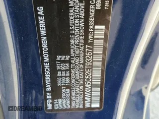 2014 MINI Hardtop with VIN WMWXM5C52ET932677, listed as a Copart auction lot 53486865 with 189,039 mi miles and Salvage title. Bid and sale history available at DreamBid. Image 12.
