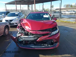 2020 Toyota Camry LE with VIN 4T1C11AK4LU916494, listed as a IAAI auction lot 41786429 with 100,032 mi miles and . Bid and sale history available at DreamBid. Image 12.