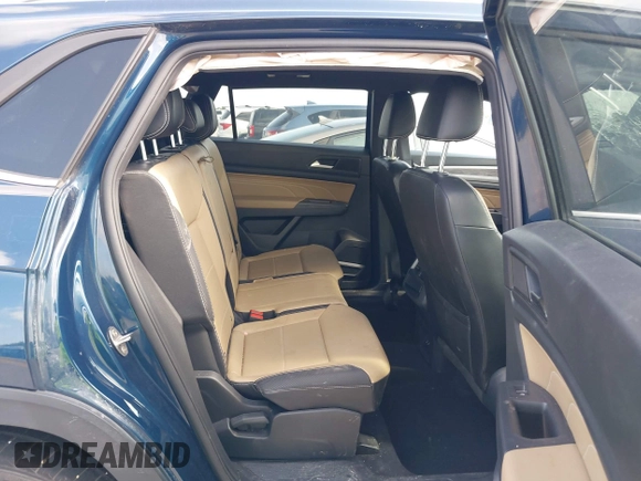 2021 Volkswagen Atlas SE z VIN 1V2WC2CA4MC232301, wystawiony jako IAAI lot #42538962 z przebiegiem Nie podano mil oraz . Historia ofert i sprzedaży dostępna na DreamBid. Obrazek 8.