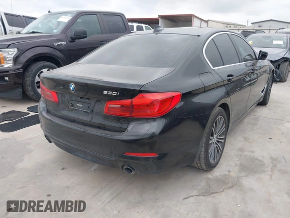 2019 BMW 5 Series 530i with VIN WBAJA5C50KWW38431, listed as a IAAI auction lot 41483263 with 94,436 mi miles. Bid and sale history available at carsss.com. Image 4.