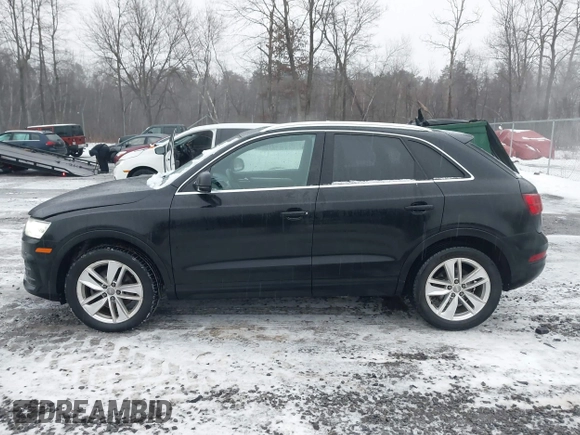 2017 Audi Q3 Premium Plus z VIN WA1JCCFS5HR000986, wystawiony jako IAAI lot #41471543 z przebiegiem 68 087 mil mil oraz . Historia ofert i sprzedaży dostępna na DreamBid. Obrazek 14.