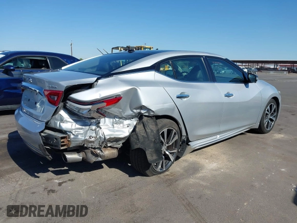 2016 Nissan Maxima SL z VIN 1N4AA6AP3GC377081, wystawiony jako IAAI lot #42235817 z przebiegiem 159 571 mil mil oraz . Historia ofert i sprzedaży dostępna na DreamBid. Obrazek 6.