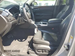 2014 Cadillac SRX Luxury Collection z VIN 3GYFNEE37ES630832, wystawiony jako Copart lot #56335035 z przebiegiem 102 076 mil mil oraz Szkody całkowita. Historia ofert i sprzedaży dostępna na DreamBid. Obrazek 7.