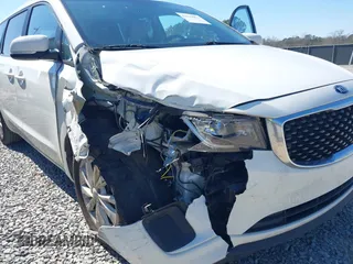 2016 Kia Sedona LX with VIN KNDMB5C10G6183002, listed as a IAAI auction lot 41629853 with 129,322 mi miles. Bid and sale history available at carsss.com. Image 6.