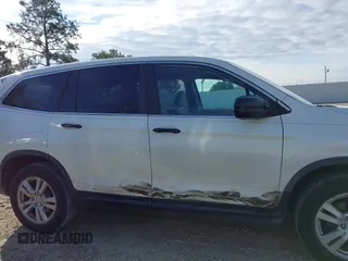 2016 Honda Pilot LX with VIN 5FNYF5H16GB033964, listed as a IAAI auction lot 41607930 with 168,137 mi miles and . Bid and sale history available at DreamBid. Image 13.