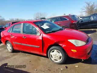 2002 Ford Focus LX with VIN 1FAFP33P42W102620, listed as a IAAI auction lot 41811223 with 167,008 mi miles and . Bid and sale history available at DreamBid. Image 6.