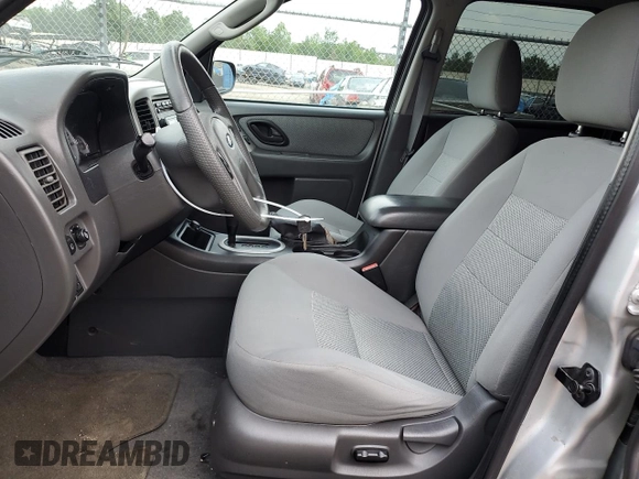 2005 Ford Escape Hybrid with VIN 1FMCU96H55KC74059, listed as a Copart auction lot 57065685 with 154,807 mi miles and Salvage title. Bid and sale history available at DreamBid. Image 7.
