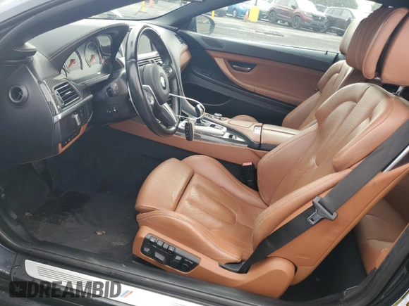 2013 BMW M6 z VIN WBSLZ9C55DDZ77804, wystawiony jako Copart lot #54121185 z przebiegiem 66 286 mil mil oraz Czysty tytuł • Clean title. Historia ofert i sprzedaży dostępna na DreamBid. Obrazek 7.