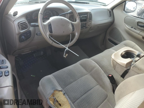 2001 Ford F-150 XL with VIN 1FTRX17W71NB71934, listed as a Copart auction lot 54231605 with 257,867 mi miles and Salvage title. Bid and sale history available at DreamBid. Image 8.