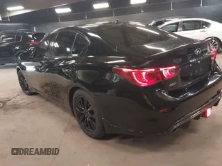 2014 Infiniti Q50 Sport with VIN JN1BV7AR0EM704993, listed as a IAAI auction lot 42492764 with 64,811 mi miles and . Bid and sale history available at DreamBid. Image 3.