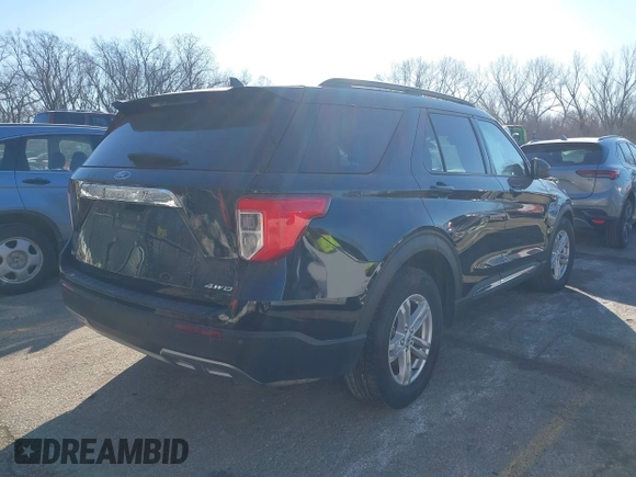 2023 Ford Explorer XLT with VIN 1FMSK8DHXPGB70042, listed as a IAAI auction lot 41429453 with 30,857 mi miles. Bid and sale history available at carsss.com. Image 4.