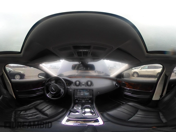 2014 Jaguar XJ with VIN SAJWA1CZ0E8V73966, listed as a IAAI auction lot 41887234 with 120,804 mi miles and . Bid and sale history available at DreamBid. Image 18.