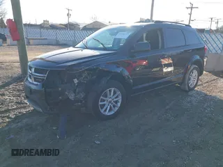 2013 Dodge Journey SXT with VIN 3C4PDCBB3DT564737, listed as a IAAI auction lot 41666723 with 169,486 mi miles. Bid and sale history available at carsss.com. Image 2.