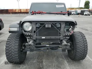 2019 Jeep Wrangler Unlimited Sport S with VIN 1C4HJXDG5KW535115, listed as a Copart auction lot 58404545 with 95,491 mi miles and Salvage title. Bid and sale history available at DreamBid. Image 5.
