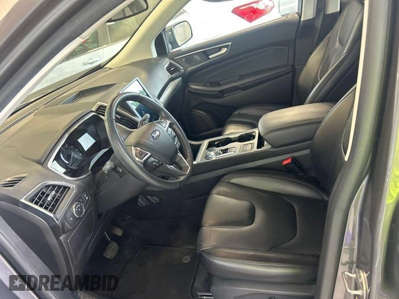 2021 Ford Edge Titanium z VIN 2FMPK3K97MBA51131, wystawiony jako IAAI lot #42529673 z przebiegiem 92 302 mil mil oraz . Historia ofert i sprzedaży dostępna na DreamBid. Obrazek 3.
