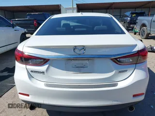 2016 Mazda 6 i Grand Touring with VIN JM1GJ1W57G1403028, listed as a IAAI auction lot 41591235 with 110,079 mi miles and . Bid and sale history available at carsss.com. Image 16.
