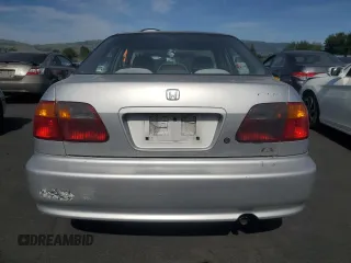 1999 Honda Civic LX z VIN 2HGEJ6675XH562090, wystawiony jako Copart lot #54111445 z przebiegiem 202 417 mil mil oraz Czysty tytuł • Clean title. Historia ofert i sprzedaży dostępna na DreamBid. Obrazek 6.