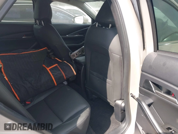 2023 Mazda CX-30 S Select with VIN 3MVDMBBM6PM518380, listed as a IAAI auction lot 40720006 with 13,422 mi miles and . Bid and sale history available at DreamBid. Image 8.