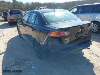 2017 Mitsubishi Lancer ES with VIN JA32U2FU4HU015140, listed as a IAAI auction lot 41890521 with 267,436 mi miles. Bid and sale history available at carsss.com. Image 3.