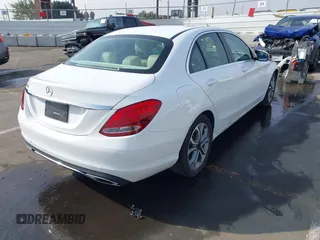 2017 Mercedes-Benz C 300 with VIN 55SWF4JB6HU210940, listed as a IAAI auction lot 41482598 with 101,135 mi miles and . Bid and sale history available at DreamBid. Image 4.