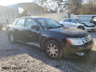 2009 Ford Taurus SE with VIN 1FAHP23W19G105781, listed as a Copart auction lot 42258155 with 118251 miles and Salvage Title. Bid and sale history available at carsss.com. Image 4.