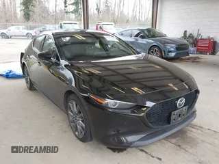 2021 Mazda 3 Premium with VIN JM1BPAML1M1322158, listed as a IAAI auction lot 41734433 with 50,396 mi miles and . Bid and sale history available at DreamBid. Image 1.